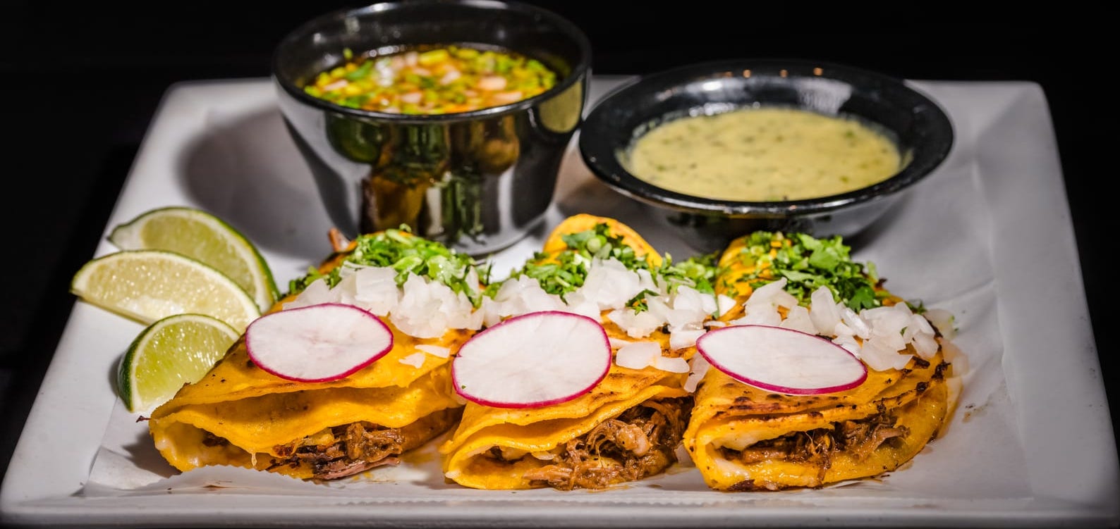 Quesabirria tacos with consommé